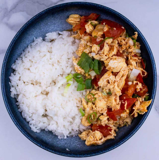 54. RISO CON UOVA STRAPAZZATE E POMODORO